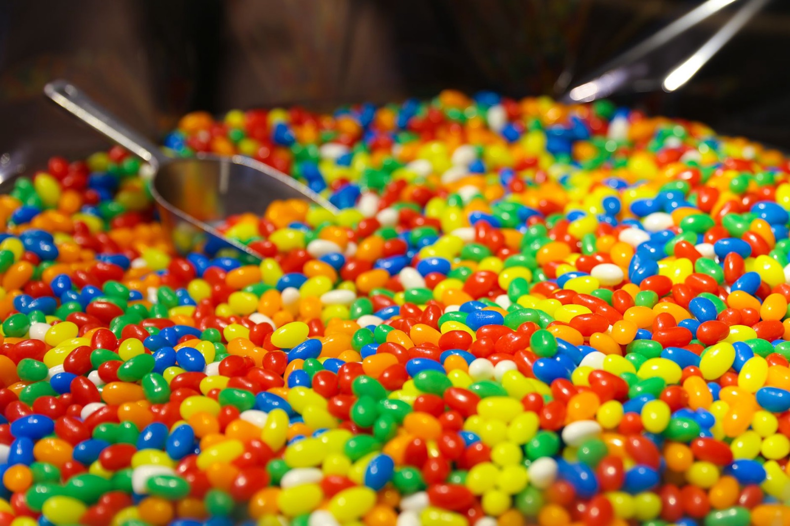 Colourful jelly beans with a scoop at a candy store